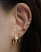 contemporary ear stack inspiration featuring new launch pieces kara and stellar ear cuffs in gold