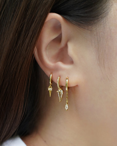 cool icicle like diamond drop earrings designed in varying lengths for impactful an ear stack