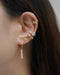 create a unique ear stack by layering these stunning esme ear cuffs with the hexad bestselling huggie hoops and earrings