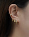 curate a diamond studded ear party with the latest jemma ear cuffs and bestselling huggie hoop earrings from thehexad.com