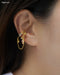 exude bold, exquisite and feminine vibes in the hexad's gypsy ear cuff in gold