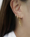 layered ear party earring pieces embellished with diamonds and cascading chains for impactful glamorous look