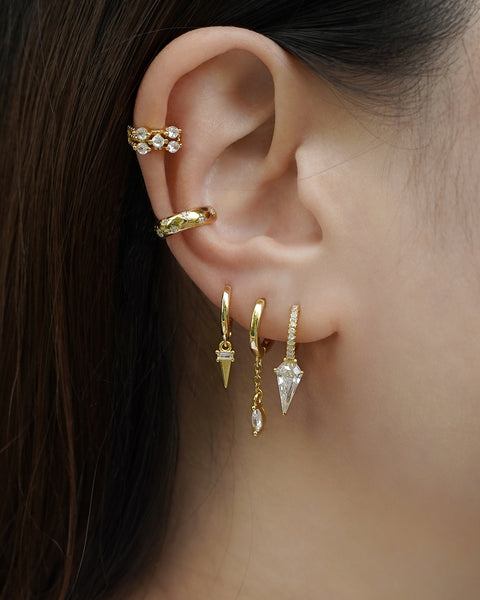 layer on these icicle huggie drop earrings set with the hexad ear cuffs for an effortlessly modern ear party