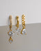 luxurious combo set of three earrings embellished with array of tear drop and round diamonds for a luxe glam look