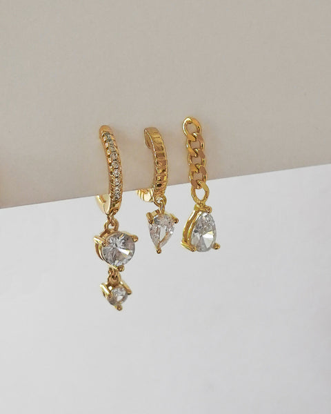 royale ear party set of three huggie hoop earrings in gold by the hexad online jewelry label