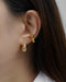 this gold pyramidal inspired ear cuff with diamantes adds an edgy three dimensionality to your ear stack